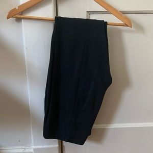 Dark blue women’s dress pants.